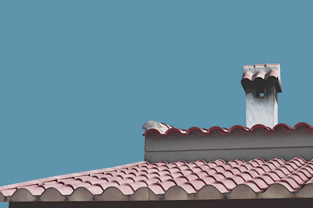 roof, fireplace, rustic, texas, blue background, red tiles